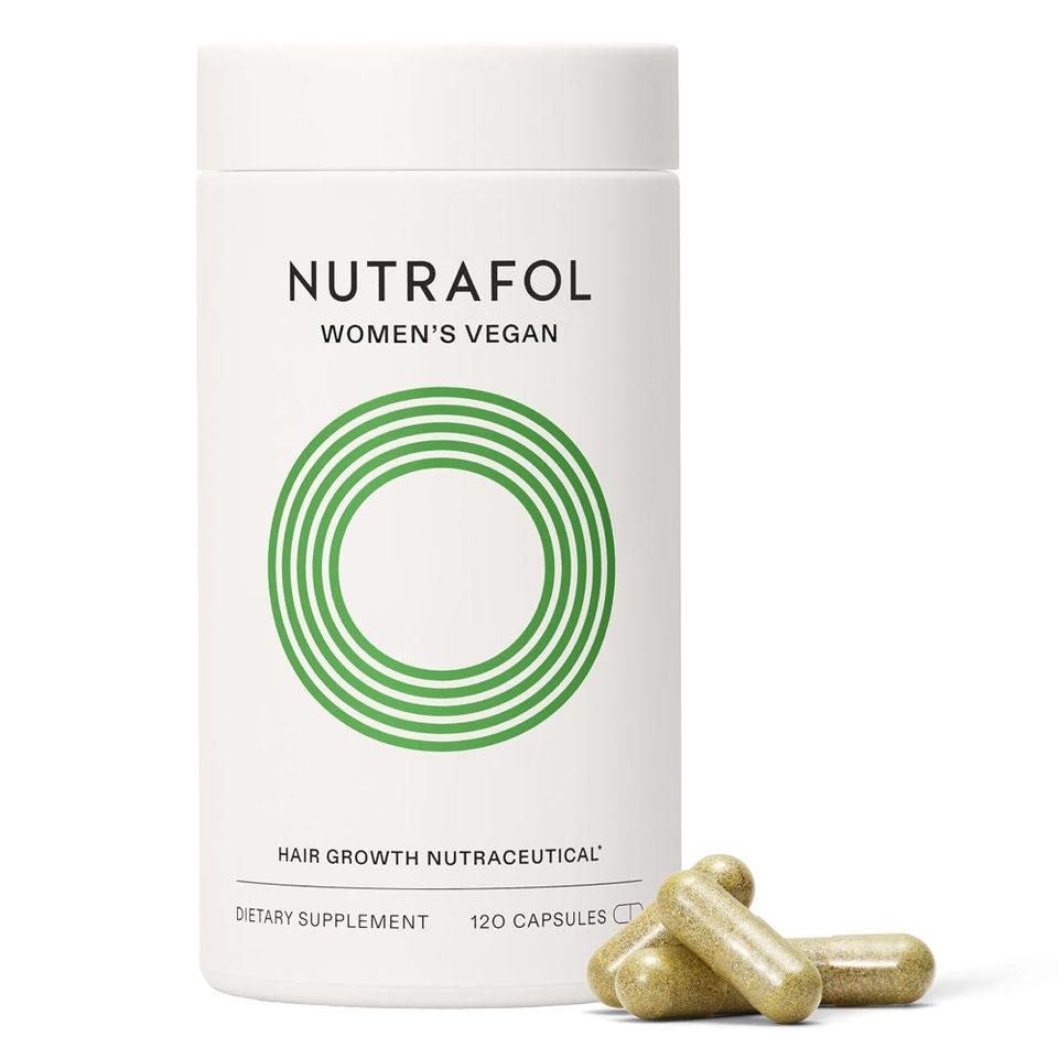 Nutrafol Womens Vegan hair growth supplement container with capsules displayed in front