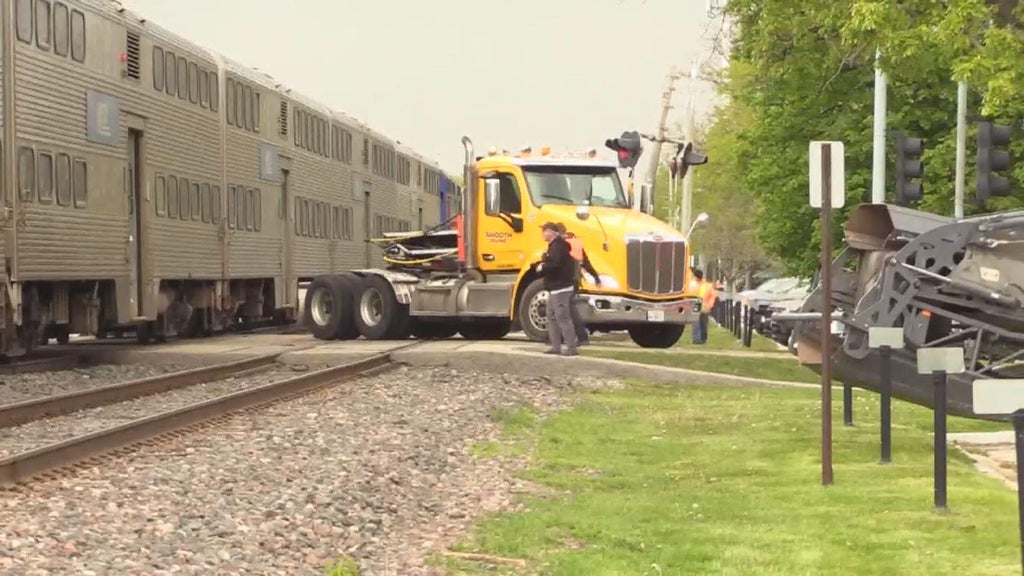 2 Metra passengers hurt when UP-North line train hits semi truck in ...