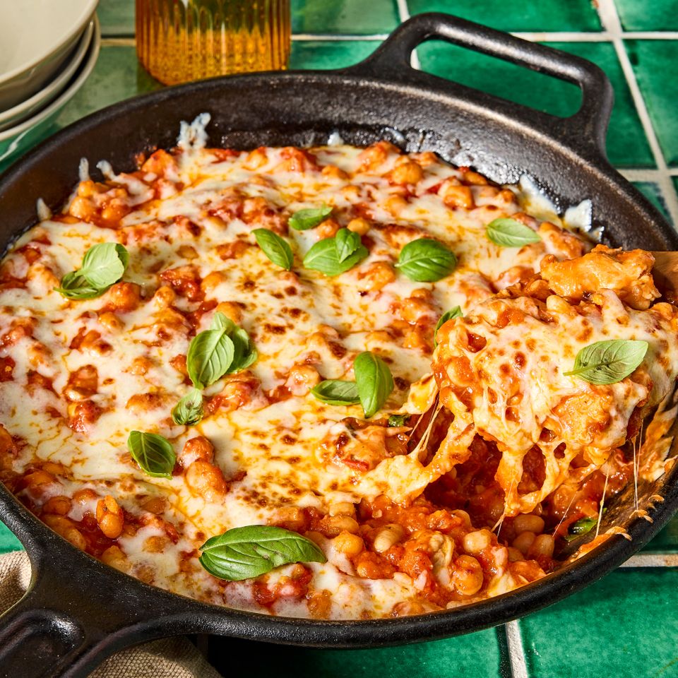 A recipe image of Chicken Parmesan Skillet with Beans.
