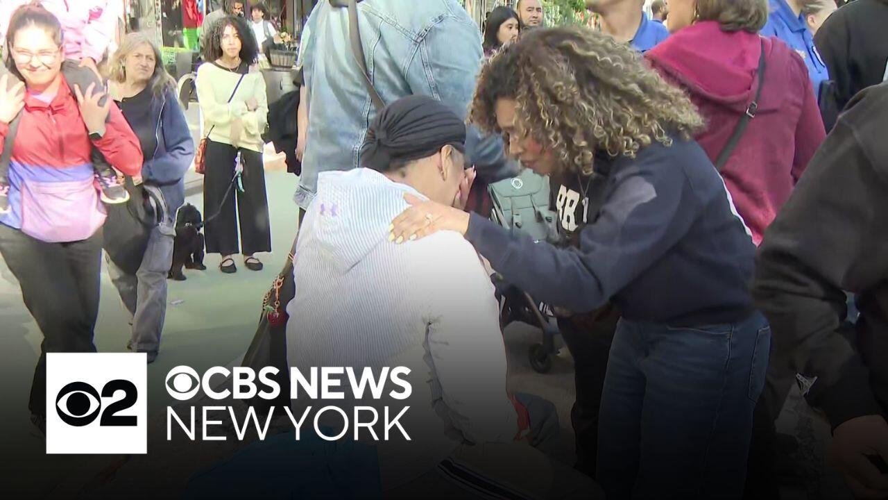 Inwood community gathers at vigil for victims of deadly fire