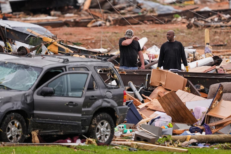 Survivors of Mississippi tornadoes crawled under furniture and held ...
