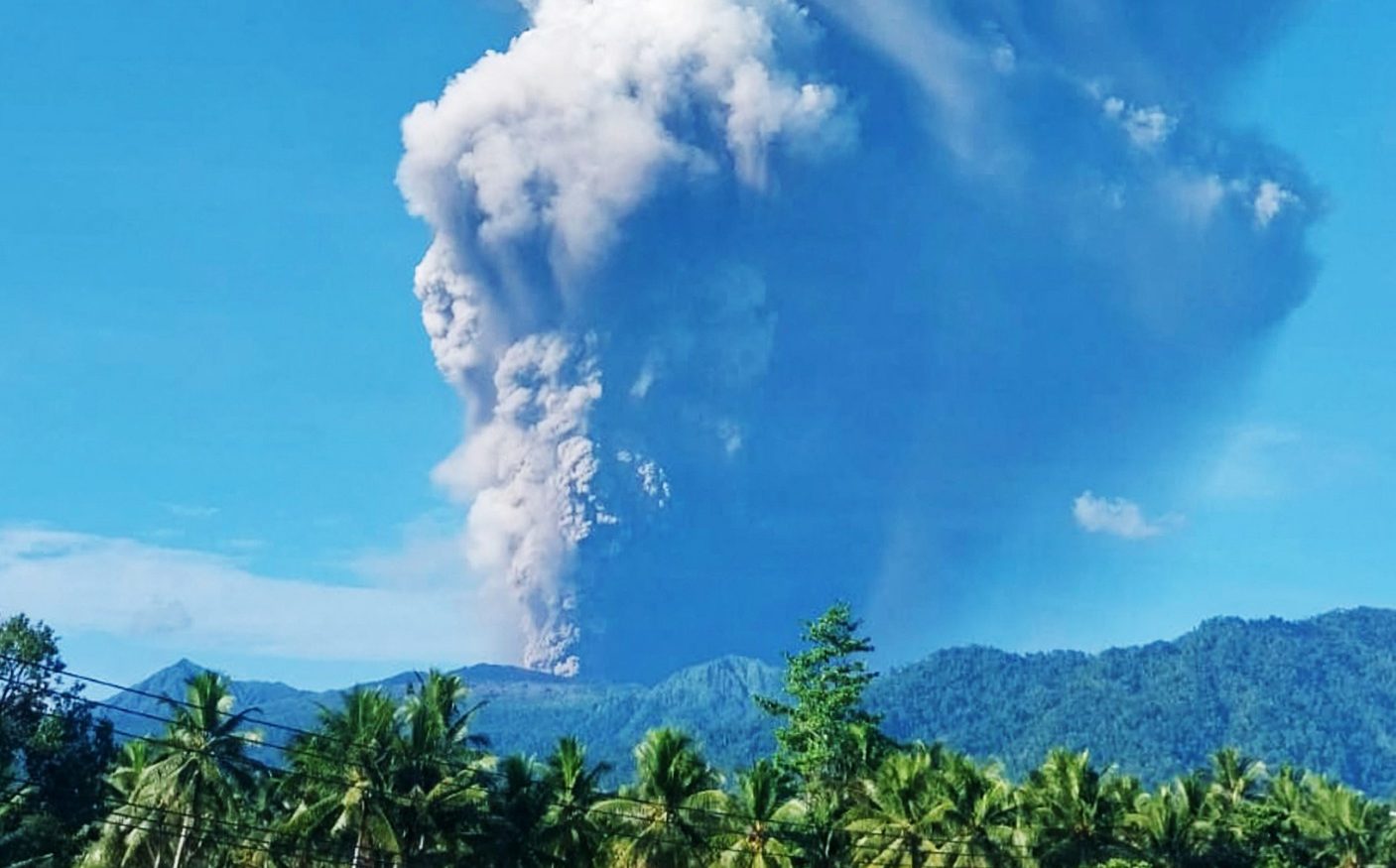 A volcano has erupted in eastern Indonesia, killing three hikers.