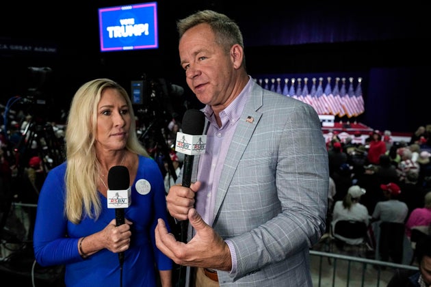 Brian Glenn, right, announced his departure from the pro-MAGA streaming platform on Thursday, just one week after the president made a snide comment about his fiancée, former Rep. Marjorie Taylor Greene (R-Ga.), left.