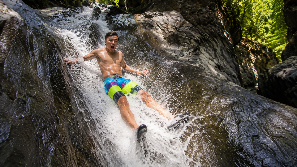 Slip and slide waterfall drops 35 feet into water