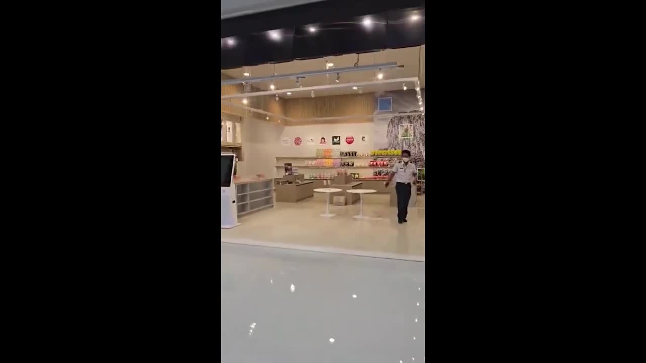 Rain pours through airport ceiling during storm in Thailand