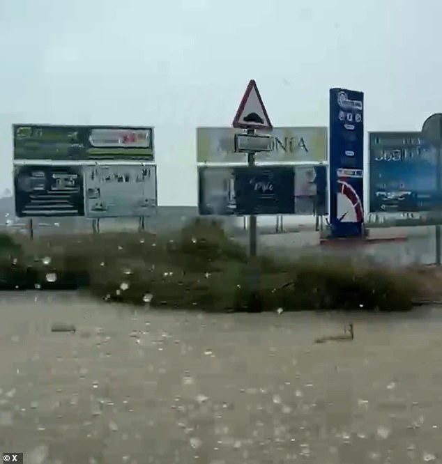 Roads become rivers in southern Spain as freak storms hit holiday hotspots