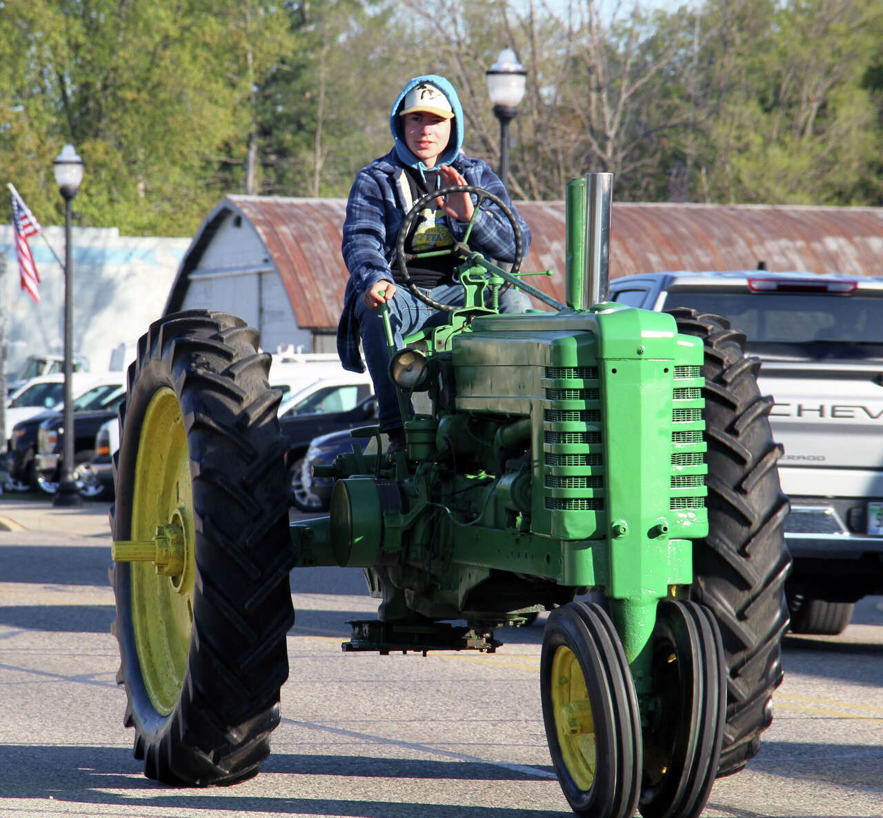 Photos: Coleman seniors roll through town for Drive Your Tractor to ...