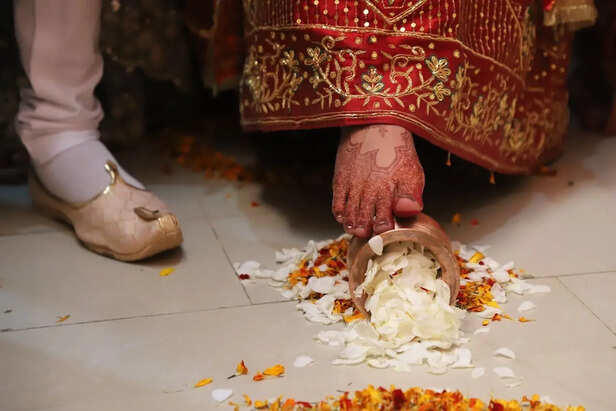 Why Hindu brides throw rice before leaving home