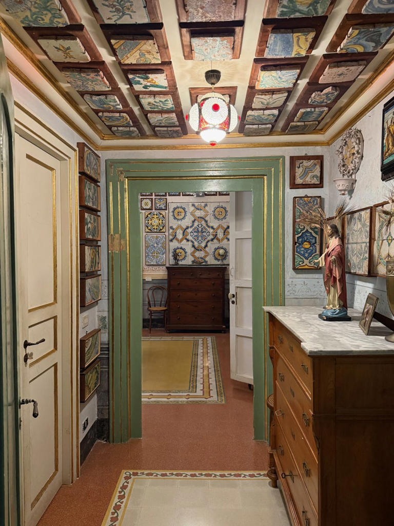 interior hallway with decorative ceiling and vintage furniture