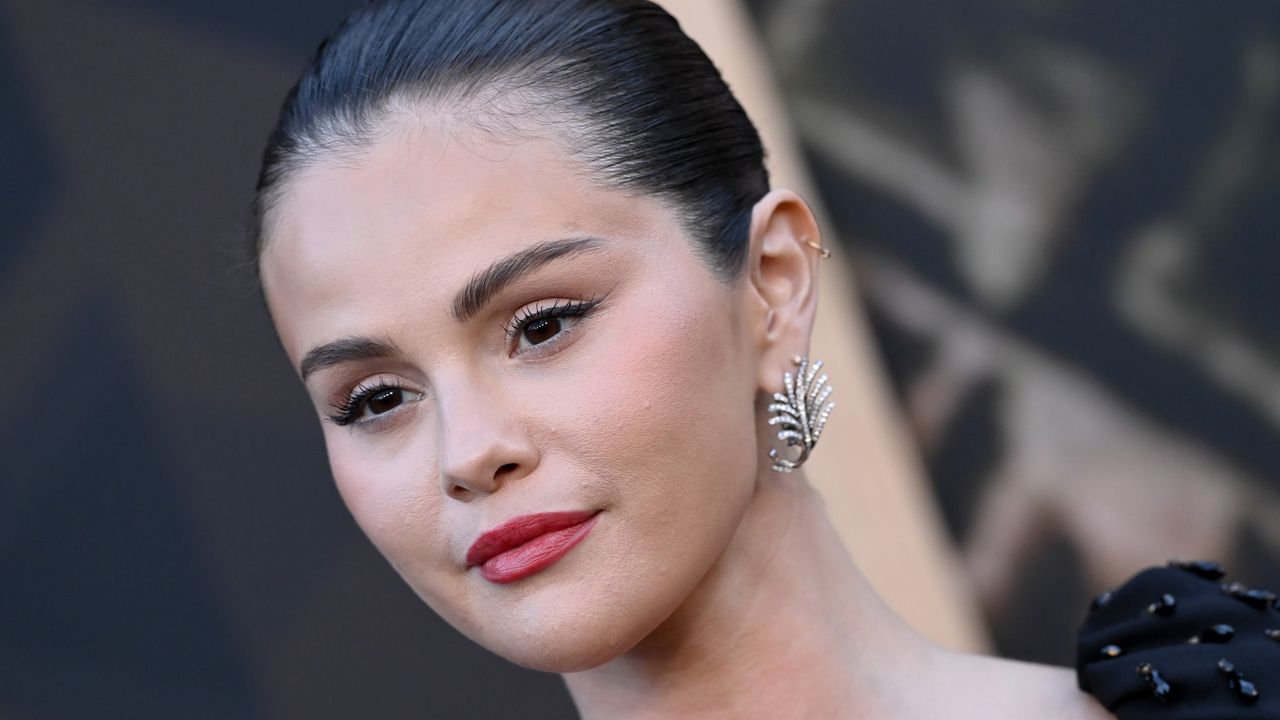 Selena Gomez ditches nude nails in favor of a bold, cherry red manicure
