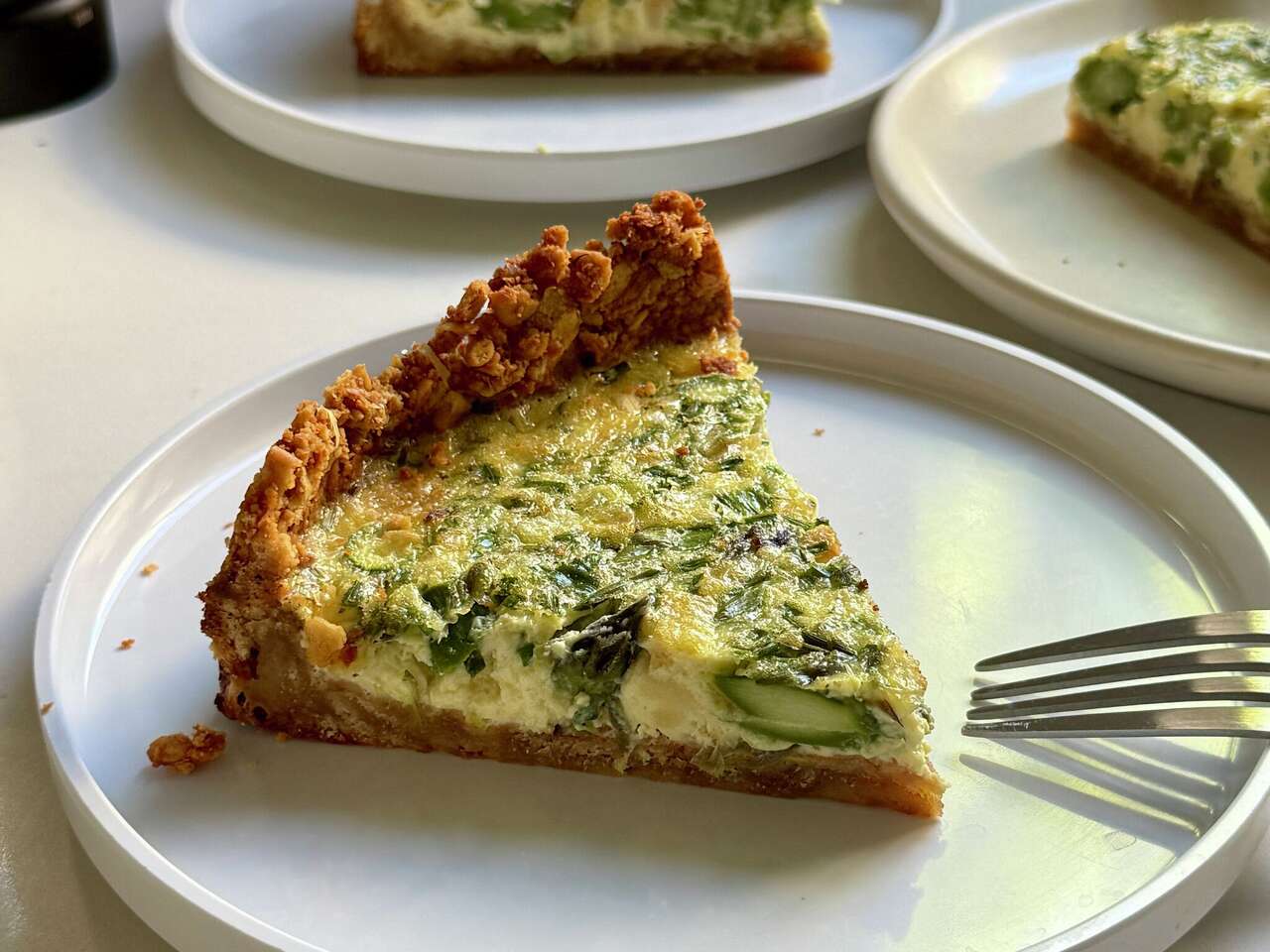 A bright spring quiche with asparagus and unfussy cracker crust