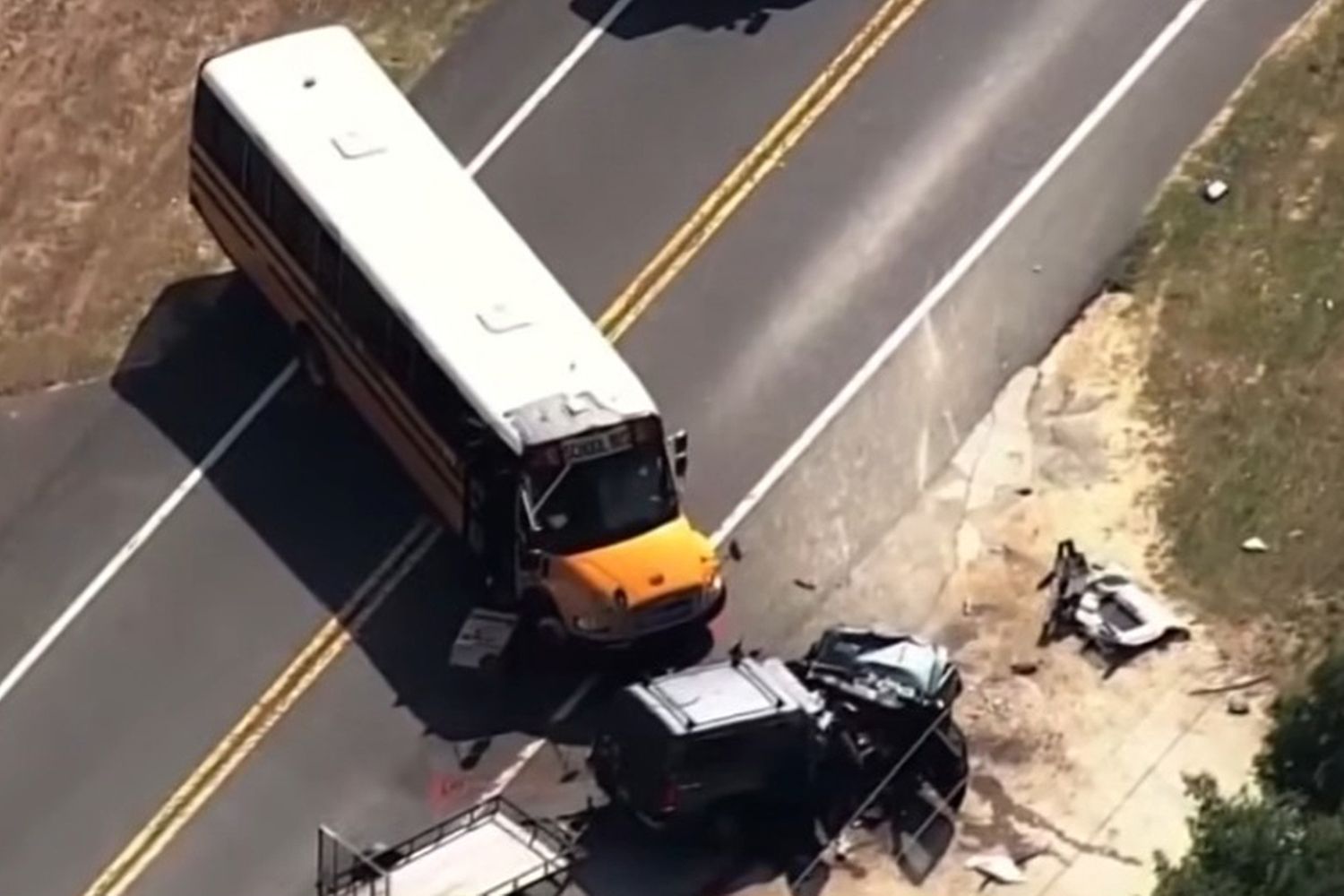 Man dies after school bus crashes with oncoming truck. Bystanders heard ...