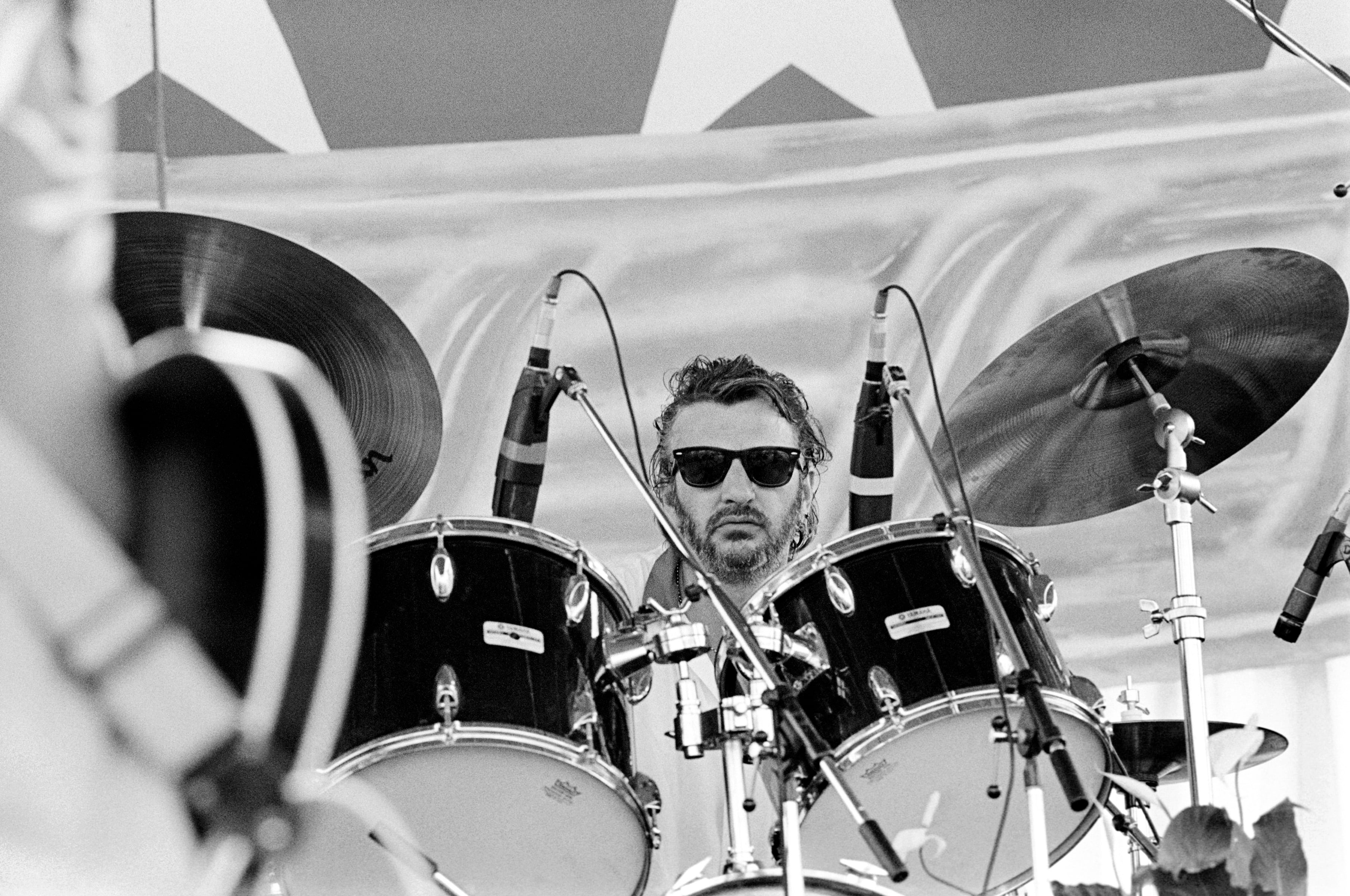 Ringo Starr performing with the Beach Boys on the Capitol Mall in Washington DC on July 4, 1984. (Photo by Ebet Roberts/Redferns)