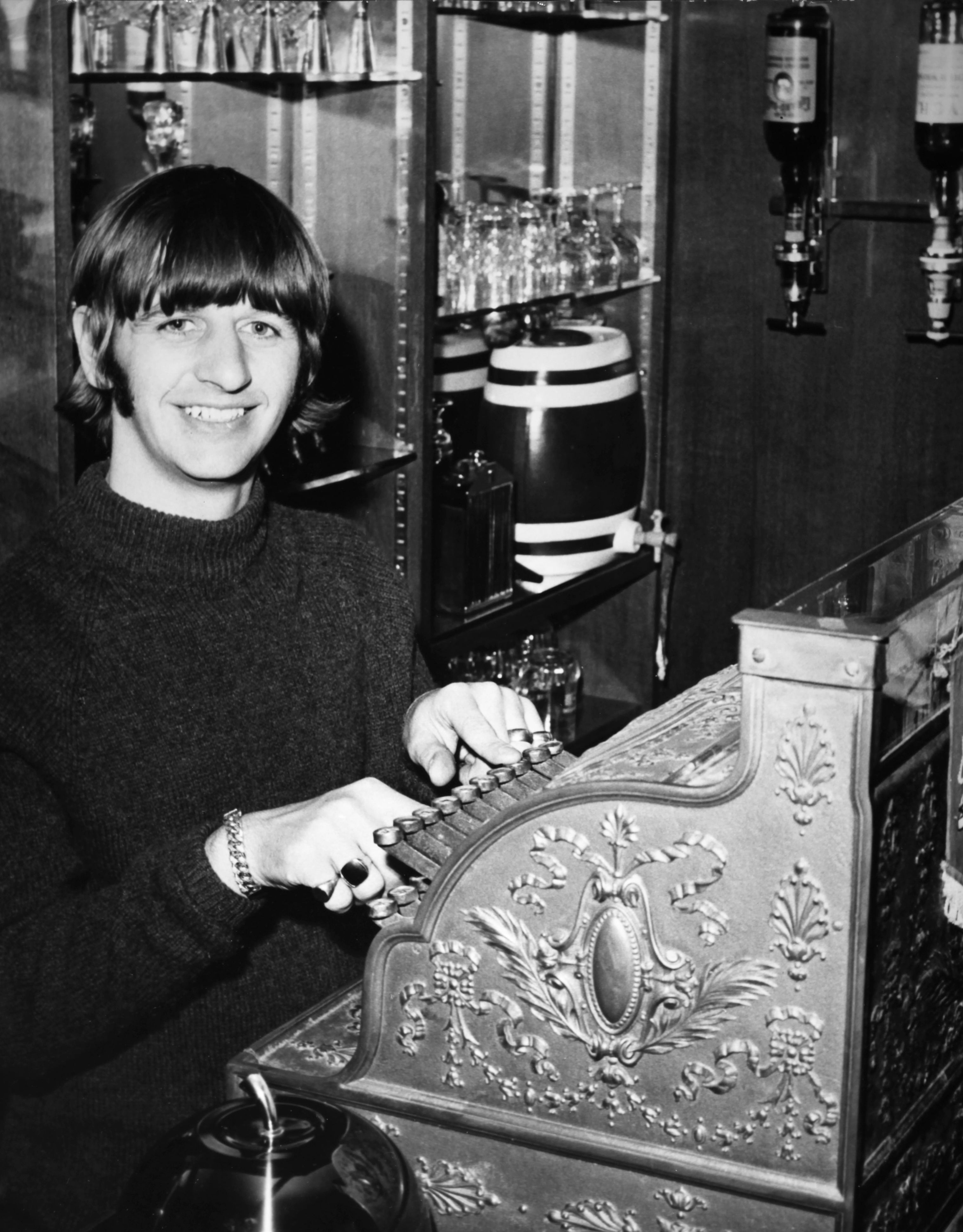 UNITED KINGDOM - CIRCA 1960: Ringo Starr playing with a cash register at home, in the United Kingdom, circa 1960. (Photo by Keystone-France/Gamma-Rapho via Getty Images)