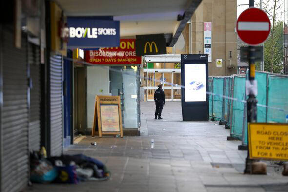 Police seal off McDonald's after acid attack leaves man in hospital