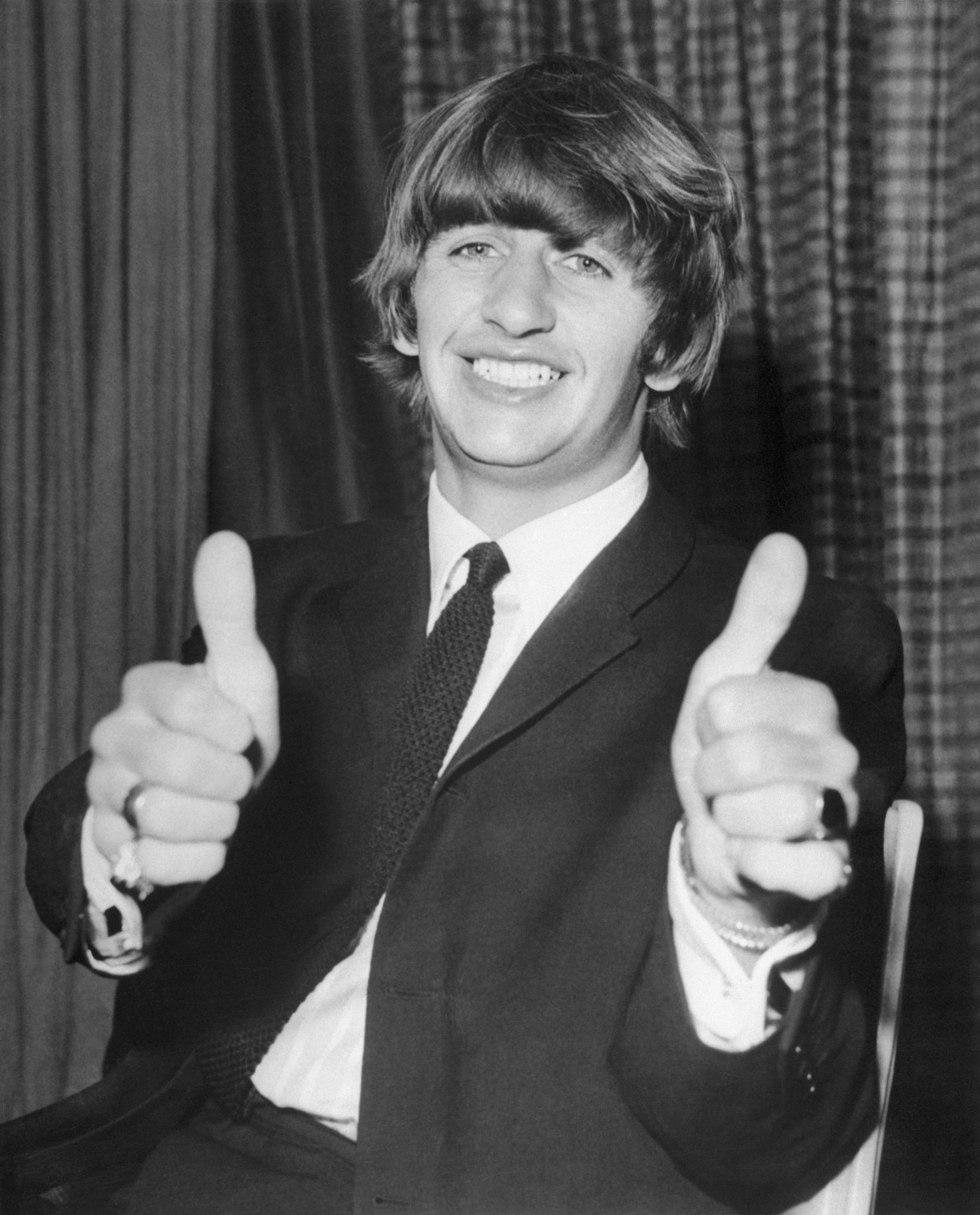Drummer Ringo Starr of The Beatles giving a