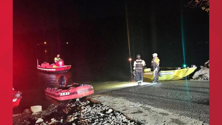 Firefighters' boat stranded on rocks during rescue in the Susquehanna River