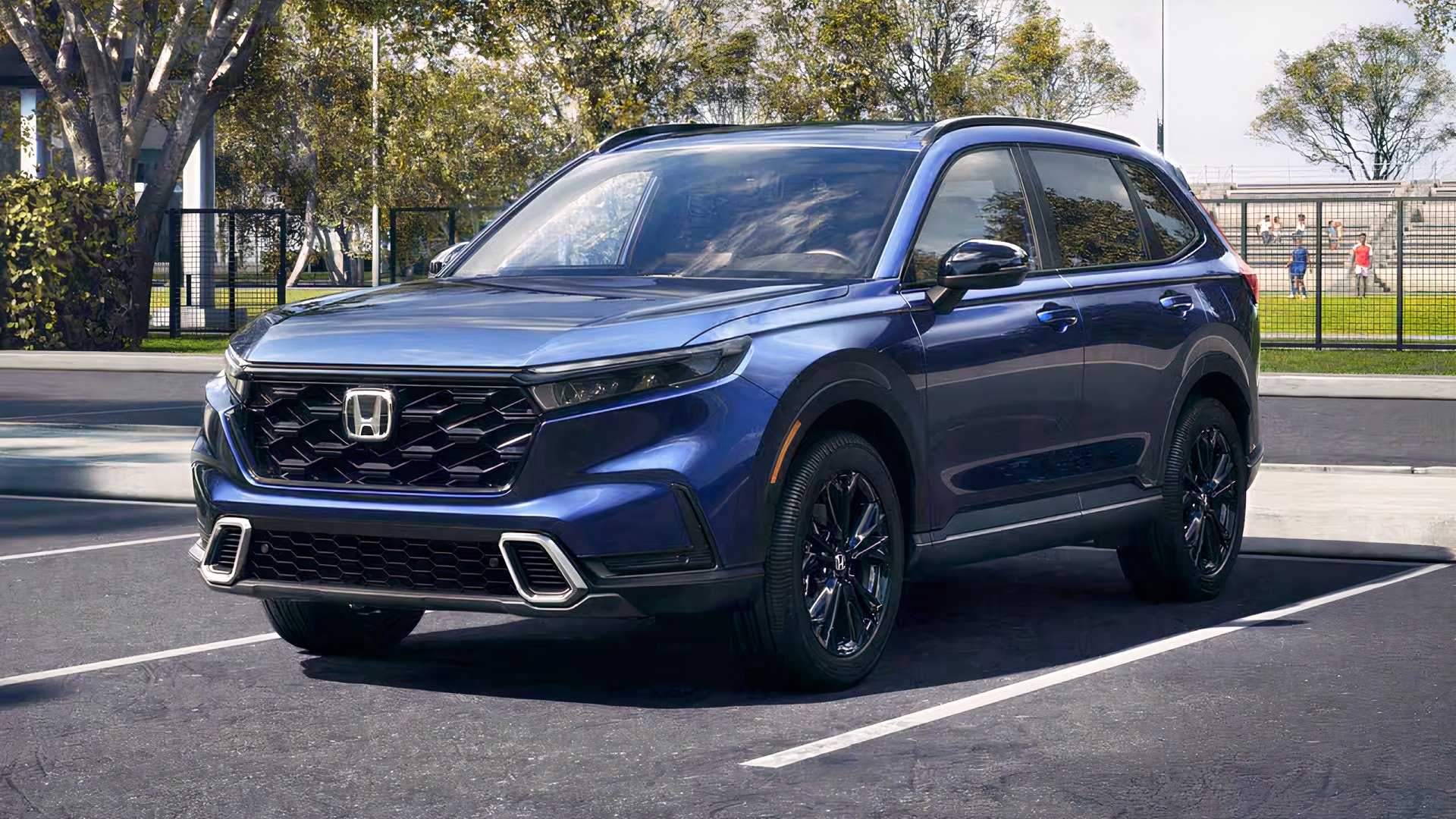 2026 Honda CR-V Sport Touring Hybrid front 3/4 shot parked on lot