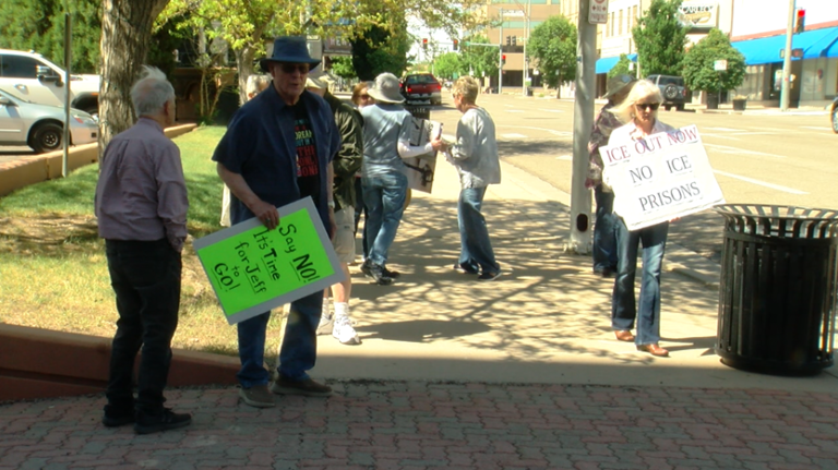 Protestors gather outside Jeff Hurd’s office in Pueblo