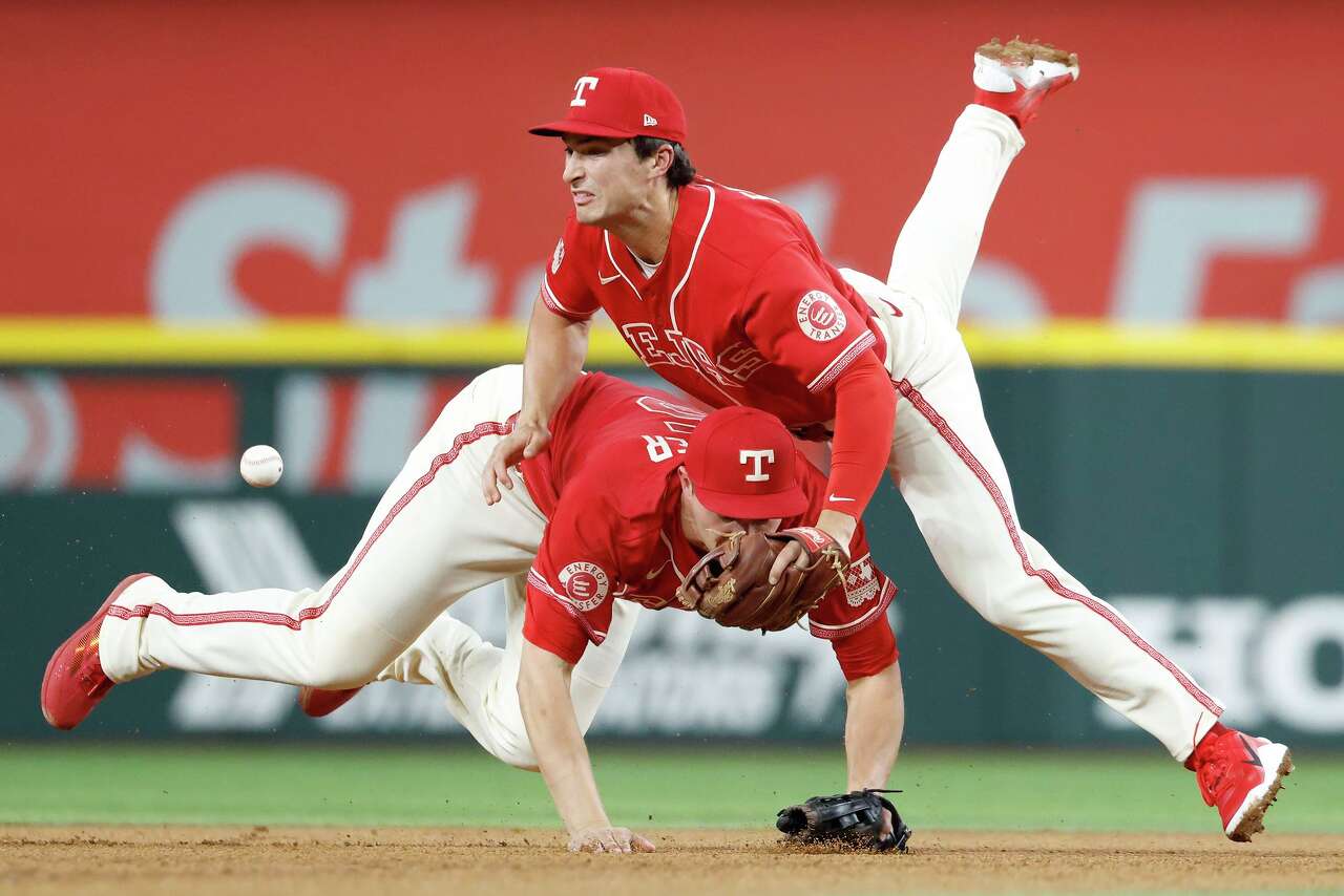 Texas Rangers' comically bad defense, hapless offense combine for ...