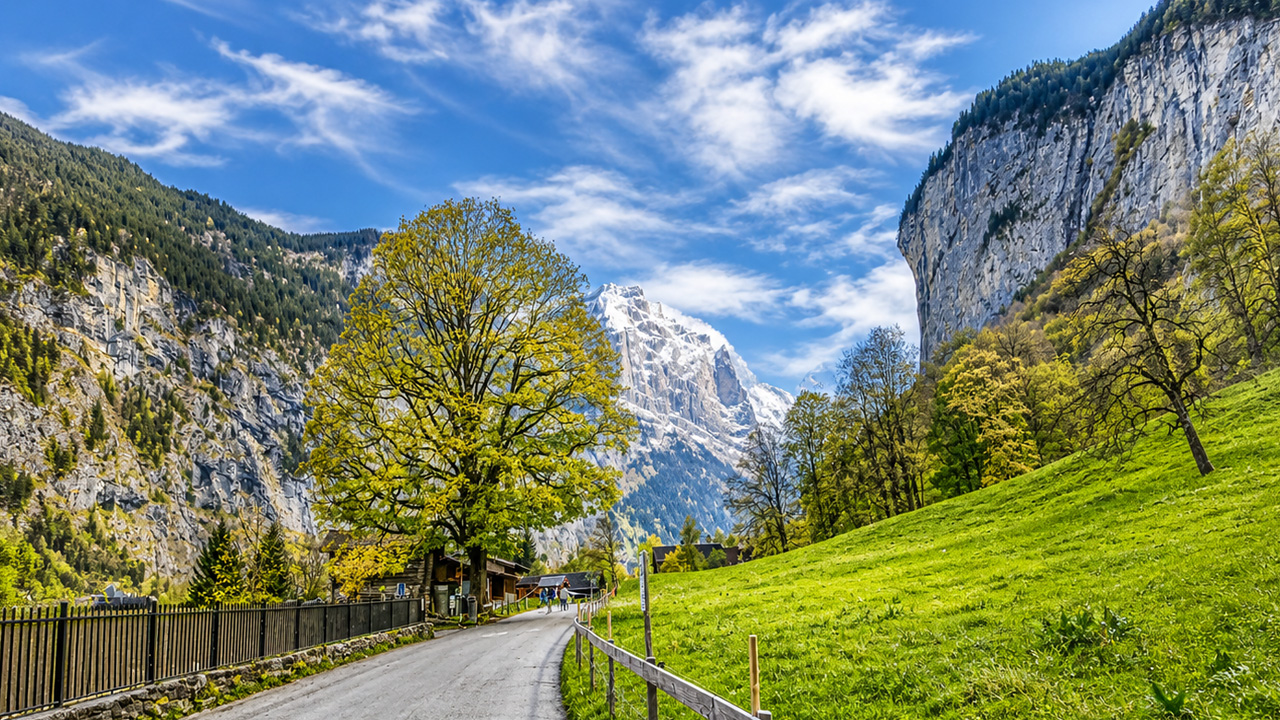 Walking through Lauterbrunnen Valley with stunning alpine views