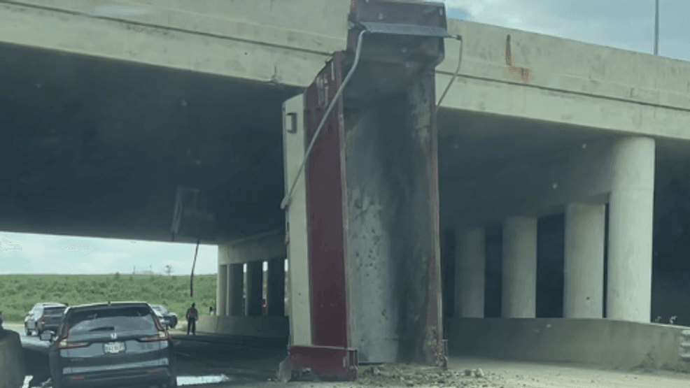 Dump truck driver seriously hurt after crashing into overpass