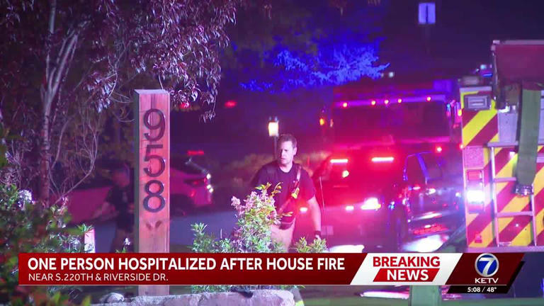 Person hospitalized and five others displaced after house fire