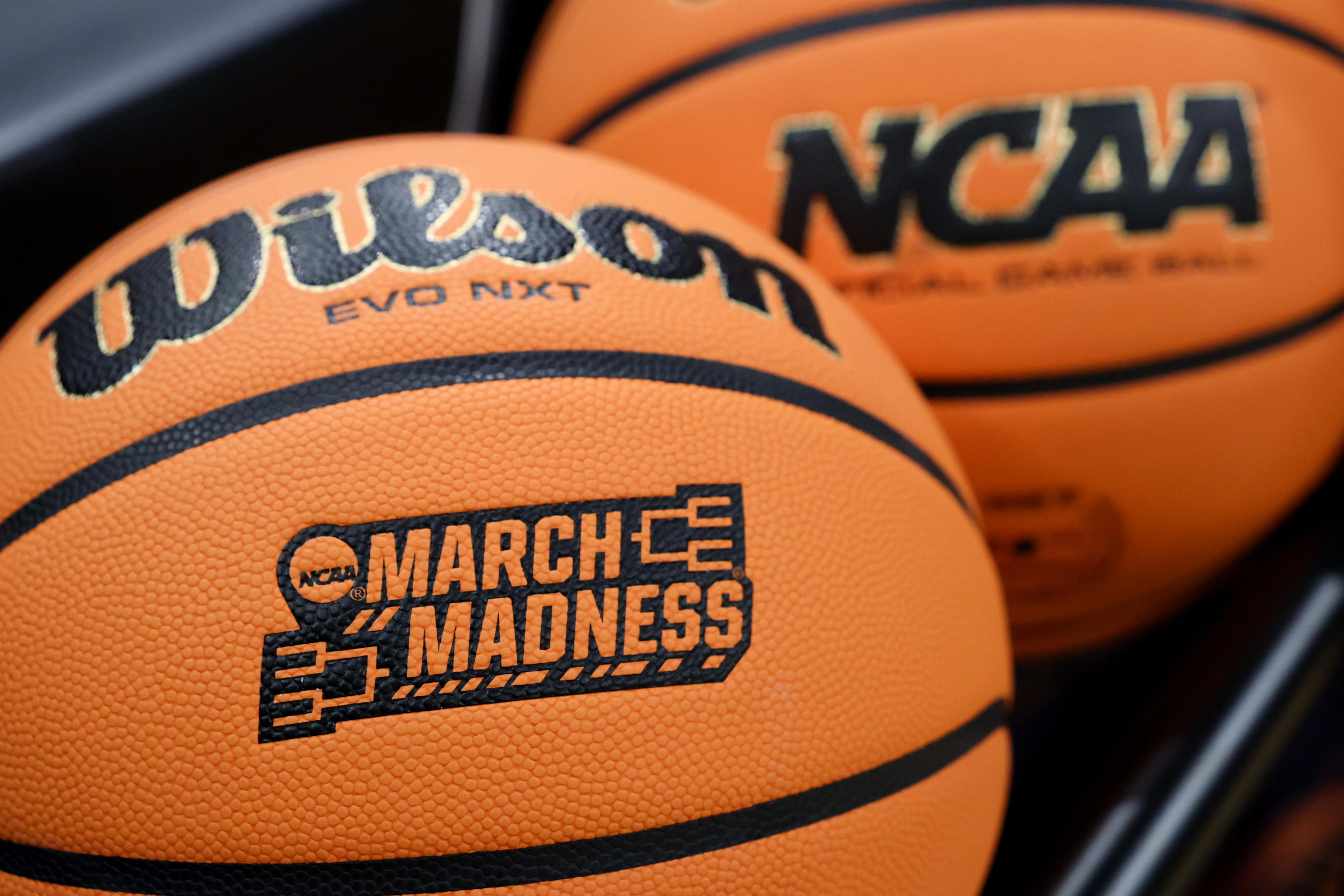 LOUISVILLE, KENTUCKY - MARCH 21: A ball displays the NCAA March Madness logo before a game in the first round of the 2026 NCAA Women's Basketball Tournament between the Louisville Cardinals and the Vermont Catamounts at KFC YUM! Center on March 21, 2026 in Louisville, Kentucky.