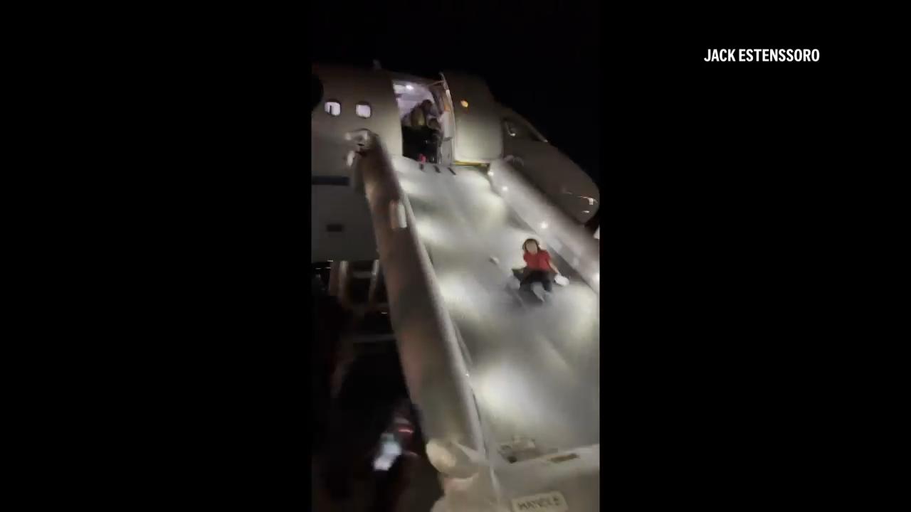 Passengers disembark after Frontier Airlines plane hits and kills ...