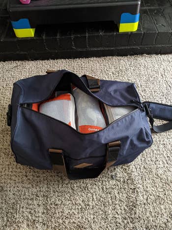 Reviewer's photo of the packing cubes inside a duffel, after packing
