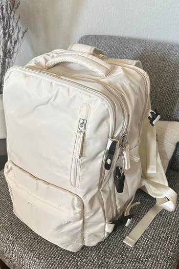 Reviewer's photo of the backpack in the color Beige