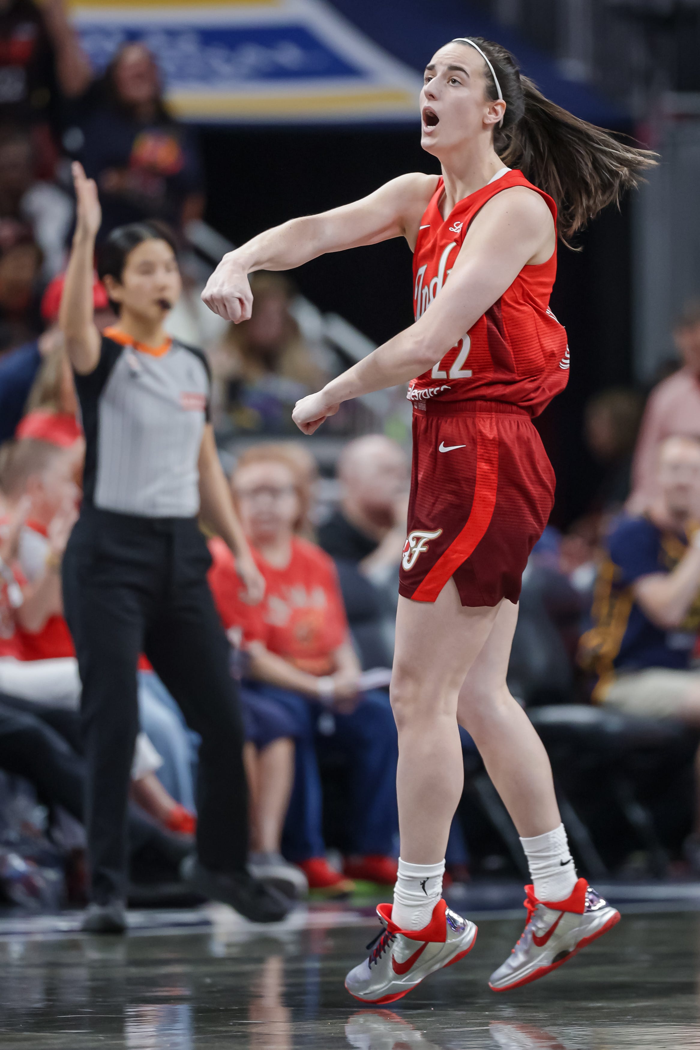 INDIANAPOLIS, INDIANA - MAY 9: Caitlin Clark #22 of the Indiana Fever reacts after a three point basket during the second half against the Dallas Wings at Gainbridge Fieldhouse on May 9, 2026 in Indianapolis, Indiana. NOTE TO USER: User expressly acknowledges and agrees that, by downloading and or using this photograph, User is consenting to the terms and conditions of the Getty Images License Agreement. (Photo by Michael Hickey/Getty Images)