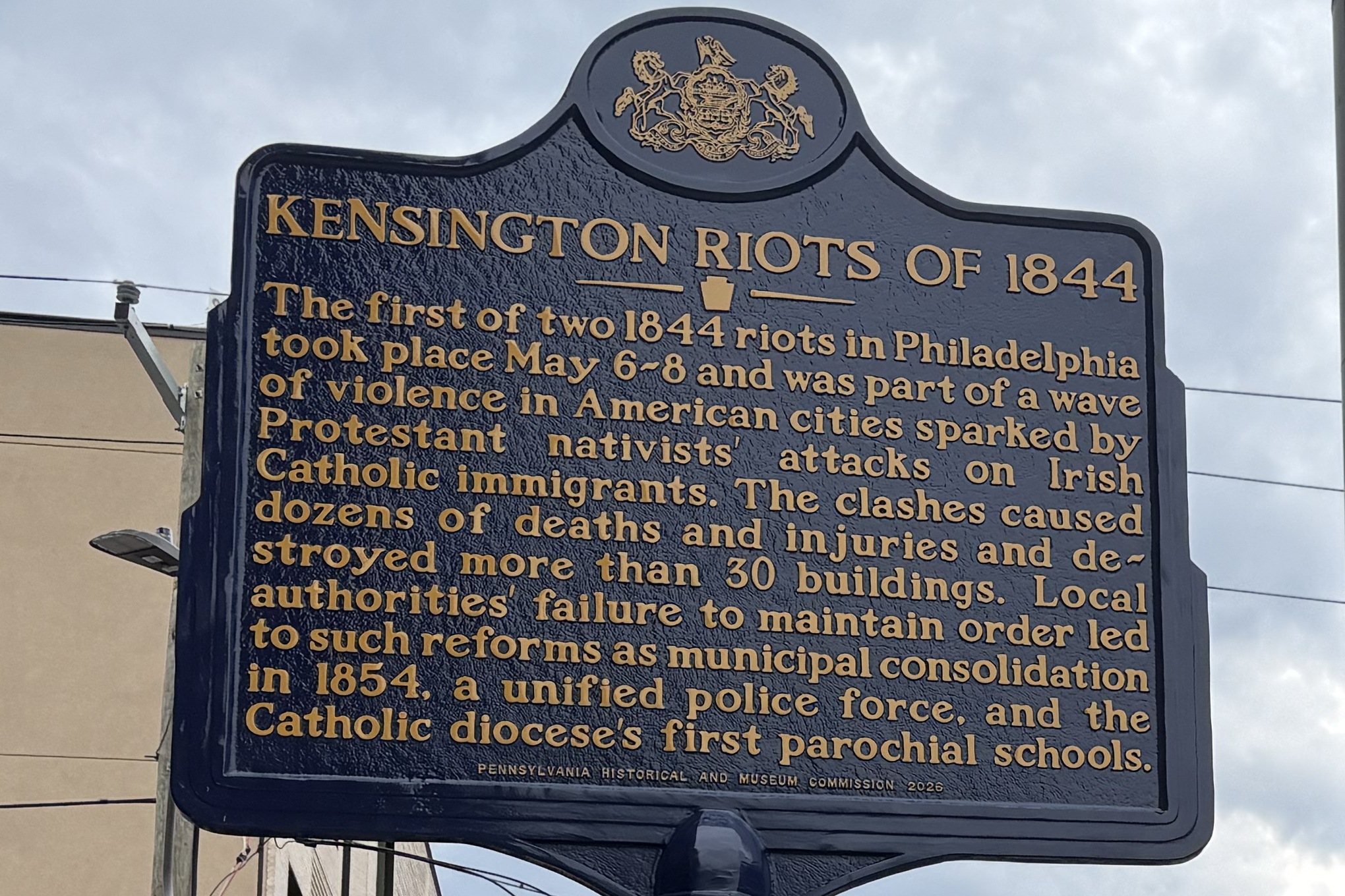 A historical marker commemorating 19th century Kensington riots and the ...
