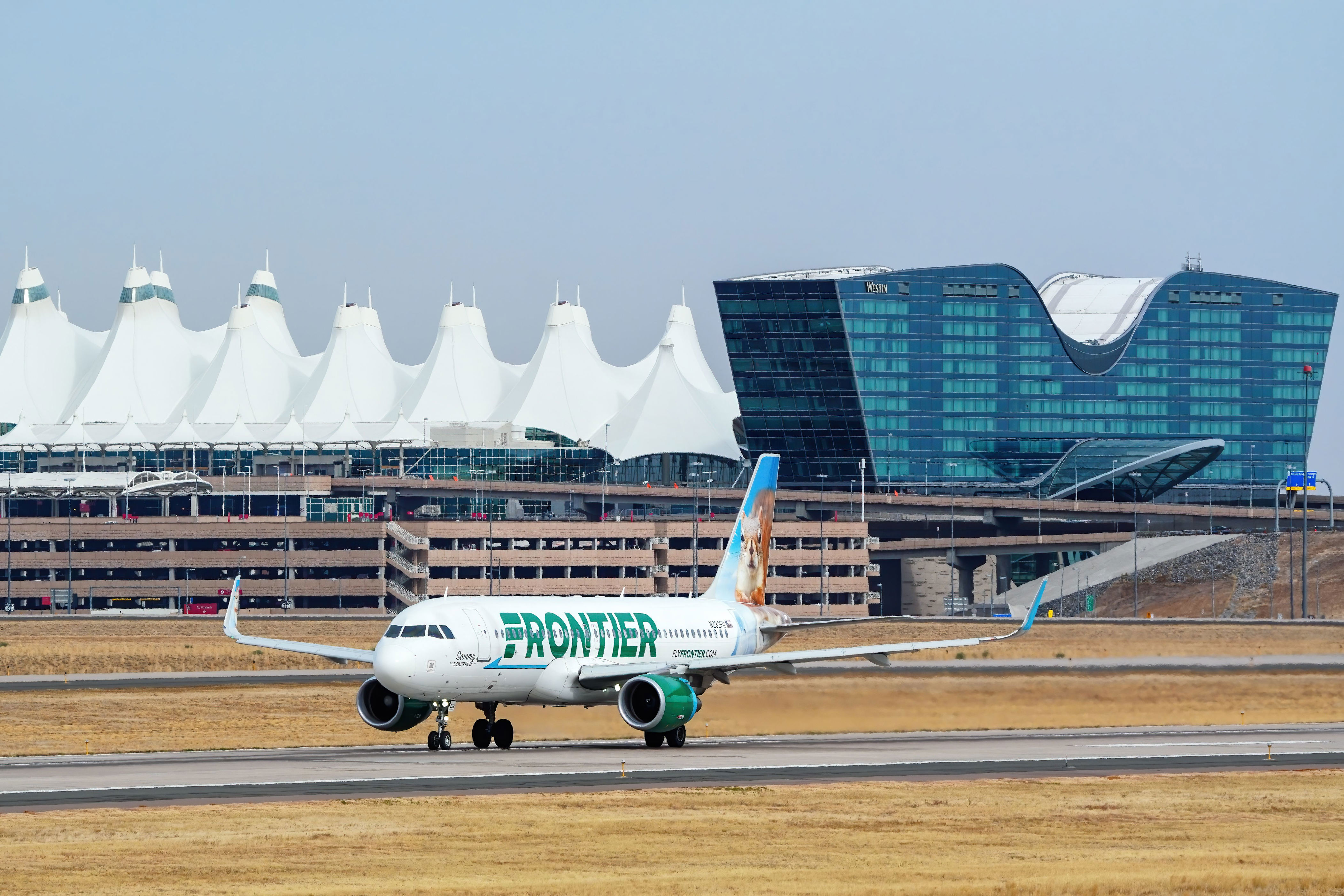 Frontier Airlines engine catches fire after hitting person on runway at ...