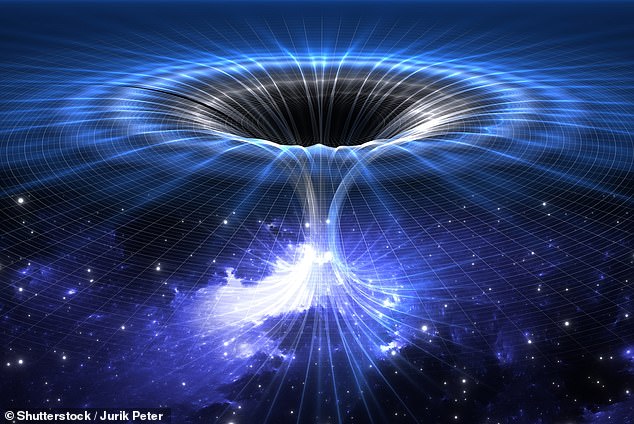 Scientists claim dark matter may have created a wormhole inside the ...