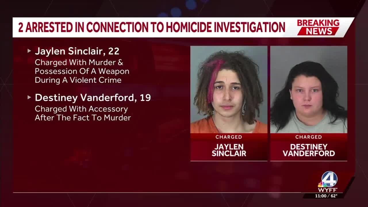 Coroner identifies victim in burning car; 2 arrested