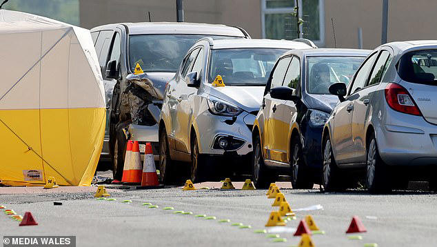 Two teenagers, 16 and 19, die after motorbike hit by BMW - as man and woman  arrested in murder probe