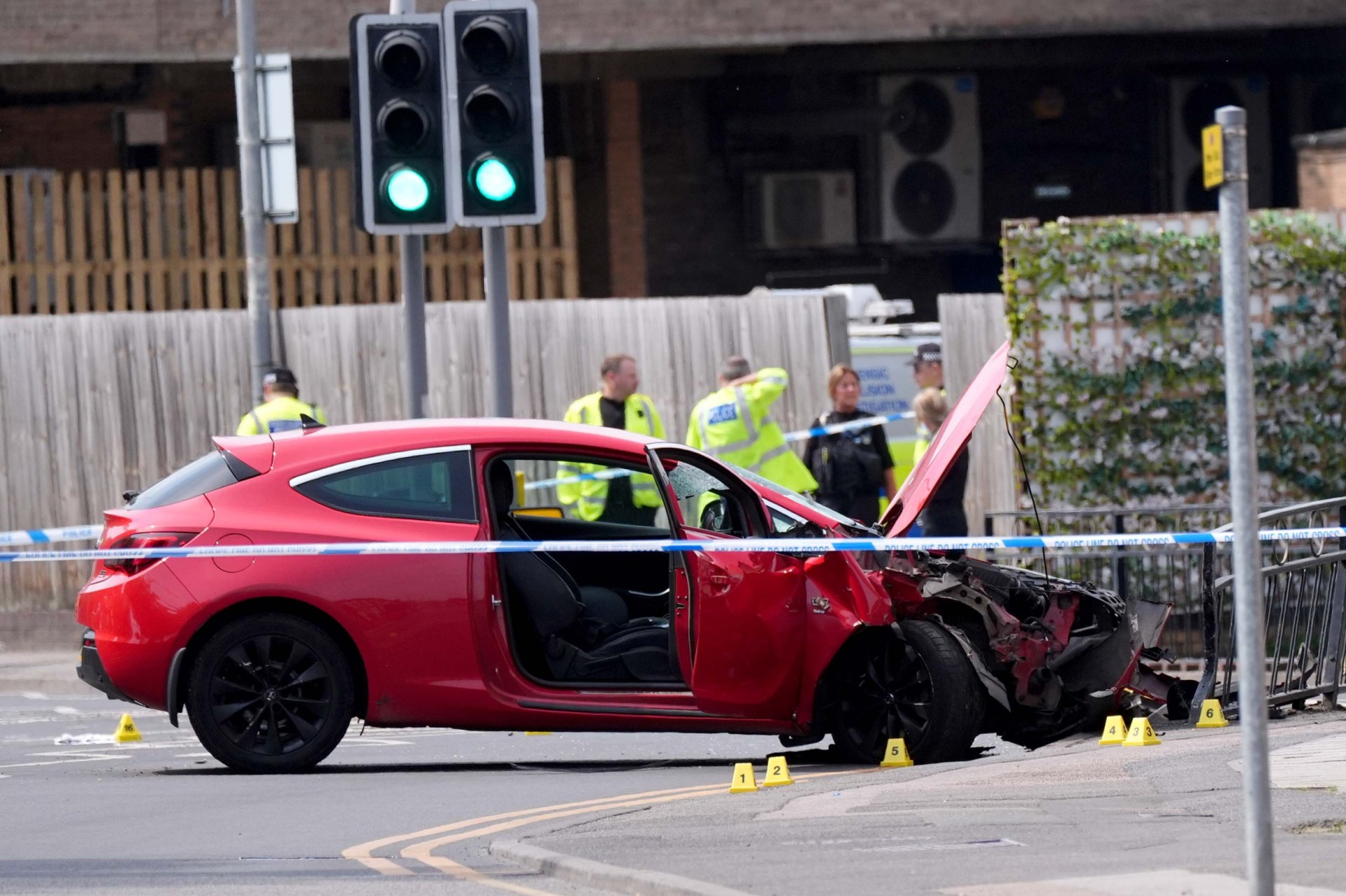 Man arrested after ploughing car into pedestrians and fleeing