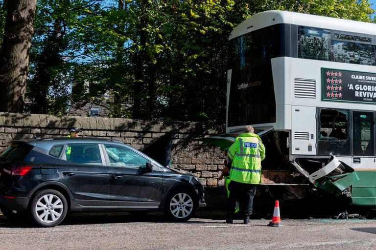 Car and bus left mangled after horror crash on busy Edinburgh road