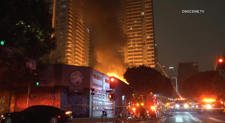Massive inferno breaks out in downtown Los Angeles as 100 firefighters ...