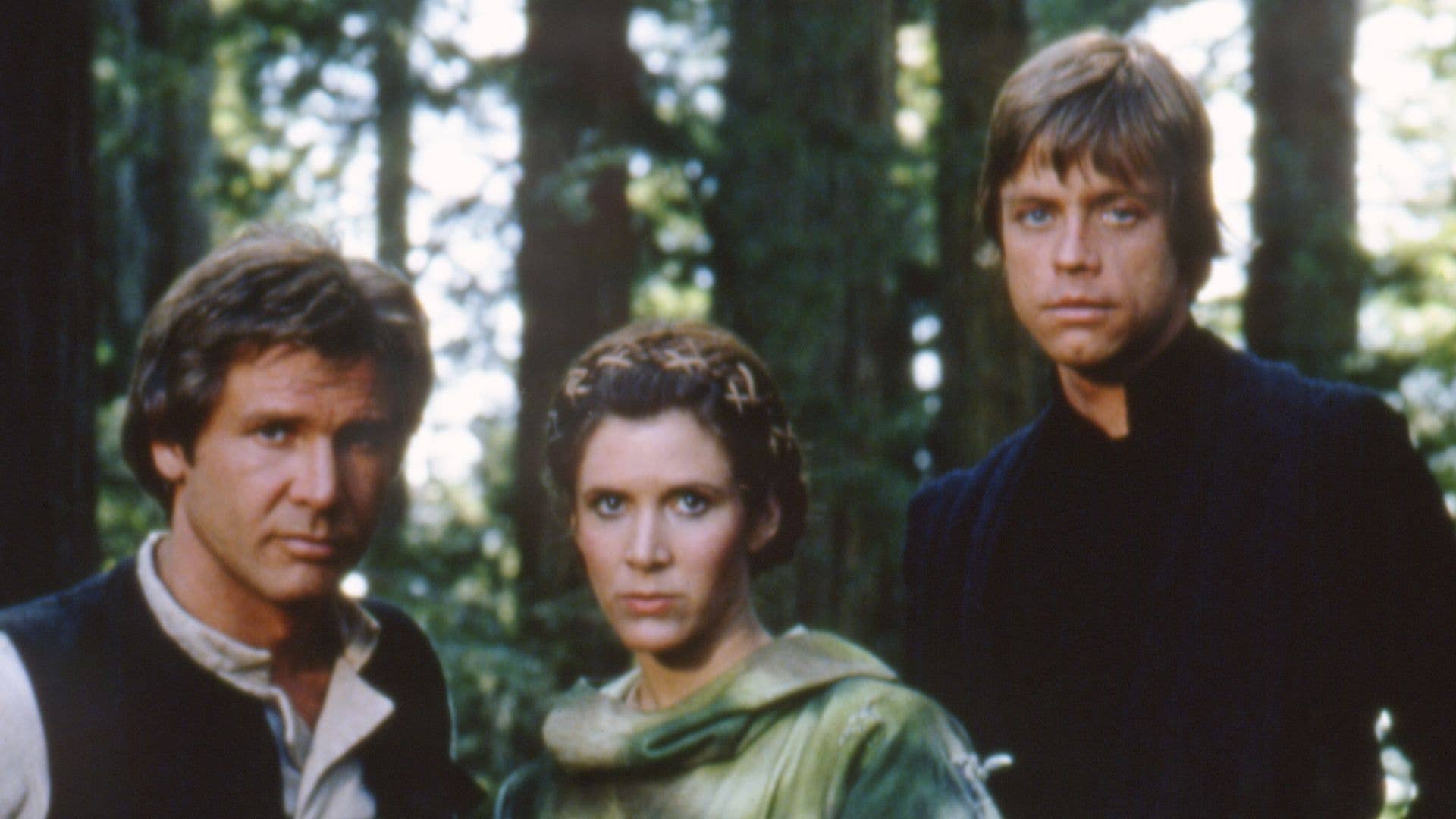 American actors Harrison Ford, Carrie Fisher and Mark Hamill on the set of Star Wars: Episode VI - Return of the Jedi directed by Welsh Richard Marquand. (Photo by Sunset Boulevard/Corbis via Getty Images)