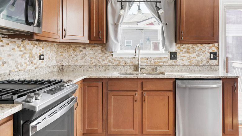 DIYer shares their solution for a dated kitchen refresh on a budget