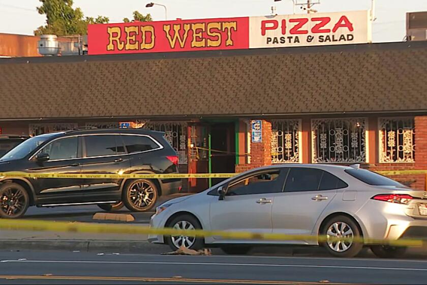 Man shot and killed while breaking up fight at Wilmington pizza shop
