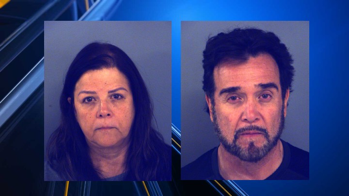 2 people arrested for animal cruelty after dogs left in vehicle