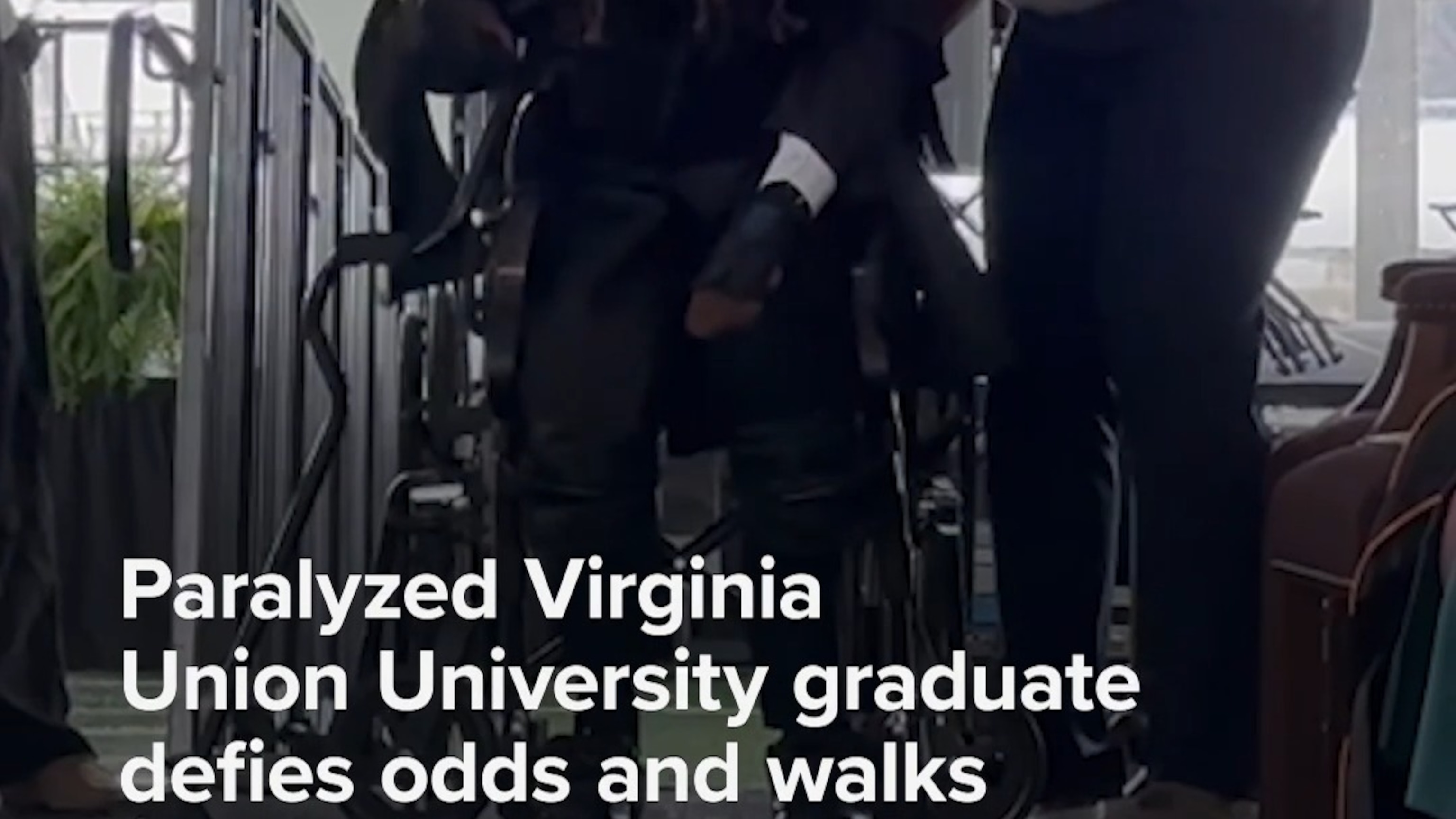 Paralyzed graduate defies odds and walks stage with robotics
