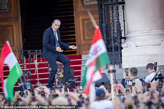 Orthopaedic surgeon Zsolt Hegedus erupted into a frenzy of air guitar, high kicks and wild arm–waving