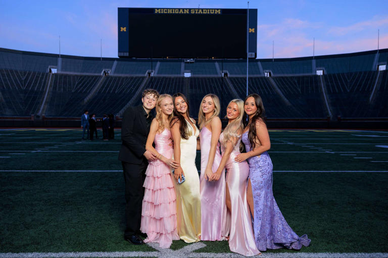 Our favorite photos from Ann Arbor Pioneer's prom at Michigan Stadium