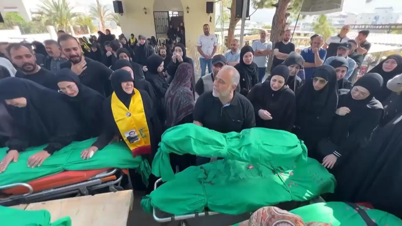 Distraught mourners bid farewell to family killed in Israeli airstrike ...