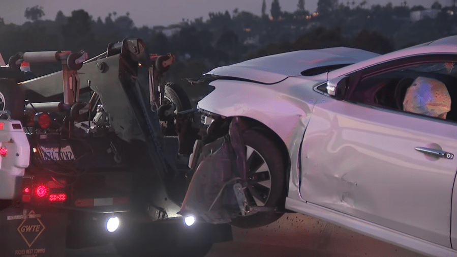 Driver arrested after crashing into center divider on SR-125