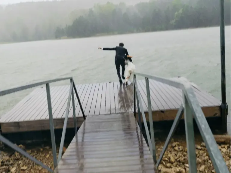 Couple’s wedding ceremony was hit by rain – then they ran straight into ...